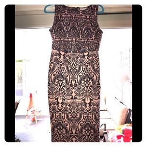 Light pink dress with navy blue pattern.